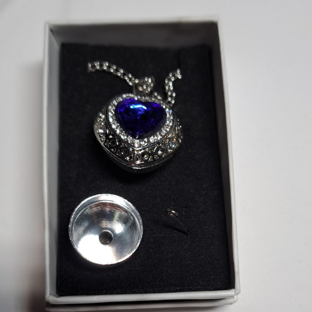 Heart-Shaped Silver Necklace with Blue Gemstone